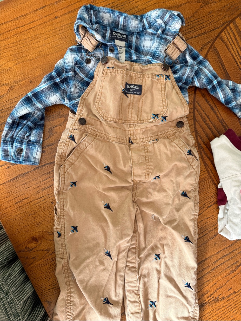 OshKosh B'gosh Tan Overalls with Blue Airplane Embroidery
